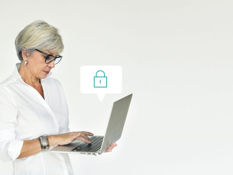 Elderly woman using a laptop